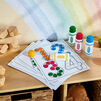Dot Markers Activity Set activity sheets and markers on table